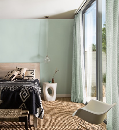 Southwest-inspired bedroom with Palladian Blue walls and Atrium White ceiling. Southwest-inspired bedroom with Palladian Blue walls and Atrium White ceiling.