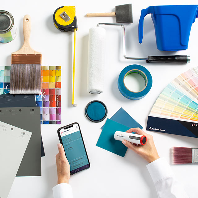 ColorReader Pro device and Color Portfolio app in use at a busy professional's desk